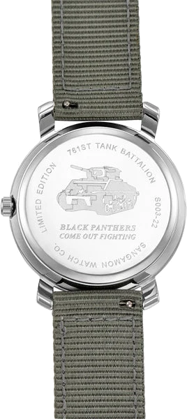 Official close-up of the 761st Tank Battalion watch caseback, with a Sherman tank engraving and the words Black Panthers Come Out Fighting.